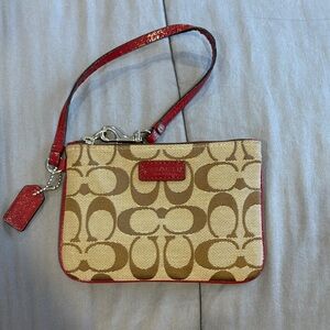 Coach Tan Signature Canvas Wristlet with Red Trim